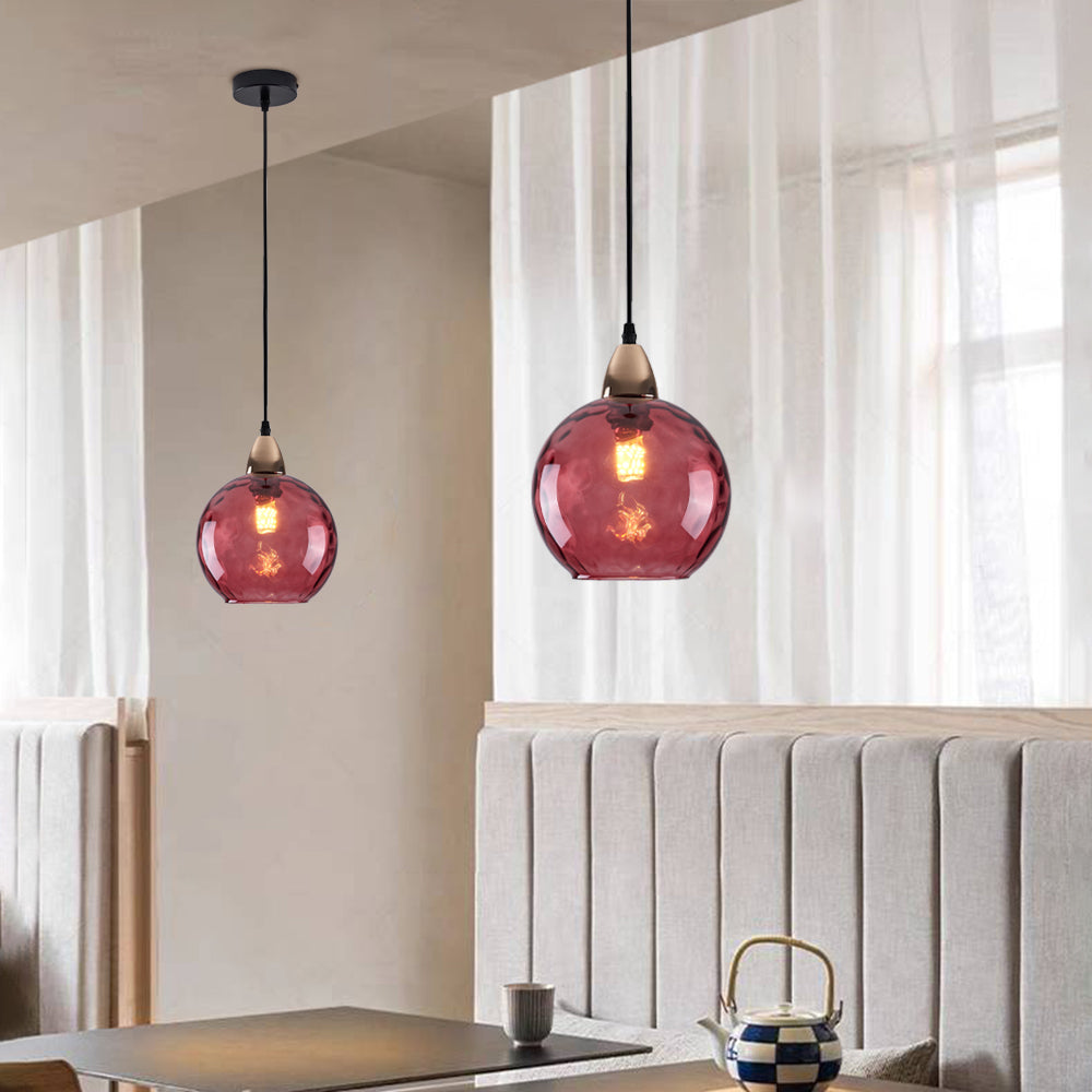 Pendellamper med vandringeffekt i globusformet glas