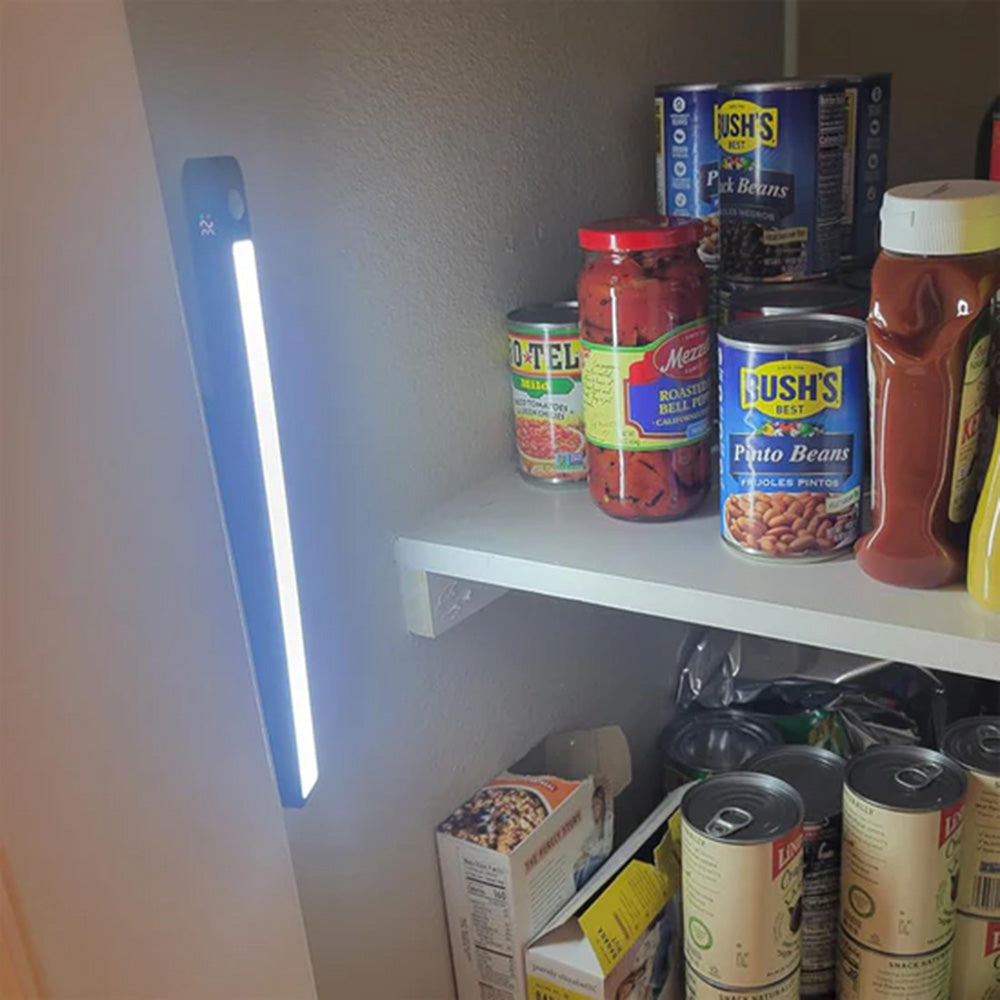 LED light bar lighting up a dark pantry shelf