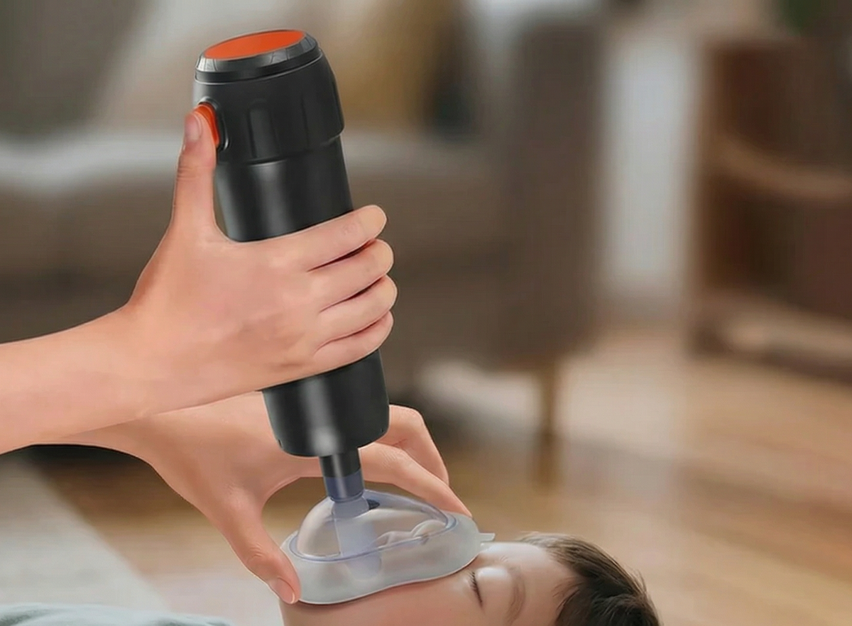 Suction device being used with a mask on a child