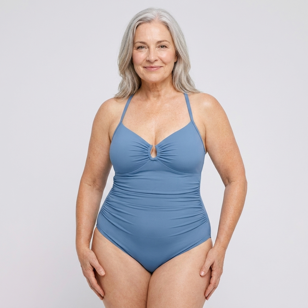 Woman wearing the Sculpt™ Smooth & Lift shaping swimsuit in light blue, front view