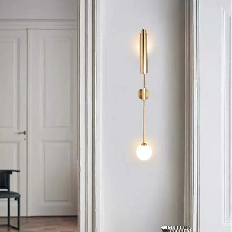 Phira gyllene vägglampa med dubbla huvuden i skidtuppsdesign