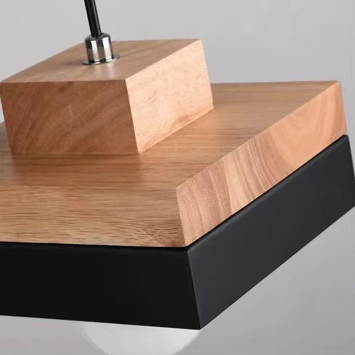 Suspension géométrique en bois Aria — design minimaliste noir et blanc