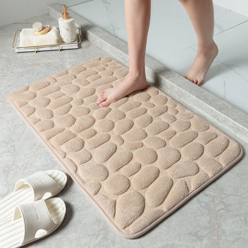 Alfombrilla de baño Cauzac™ con diseño de guijarros y espuma viscoelástica