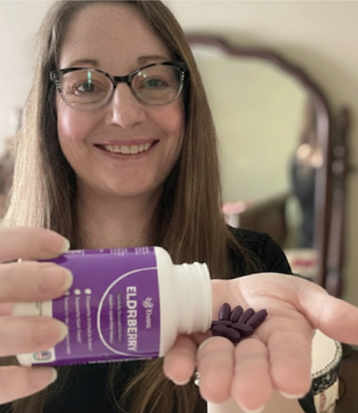 Capsules tipped from the bottle into a palm