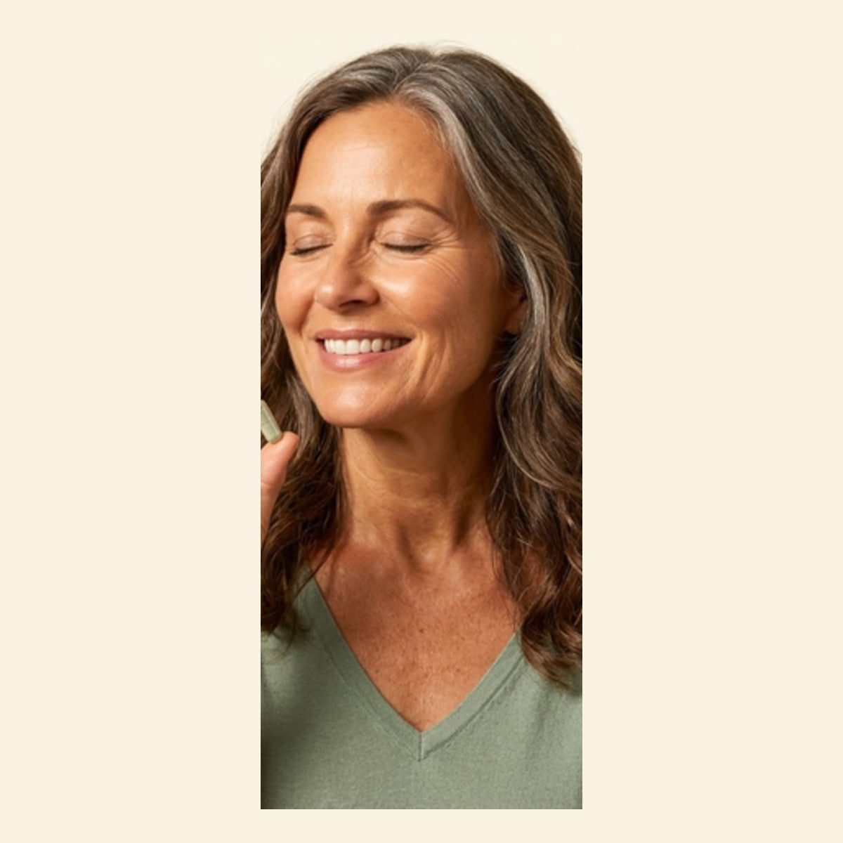 Woman taking a veggie capsule