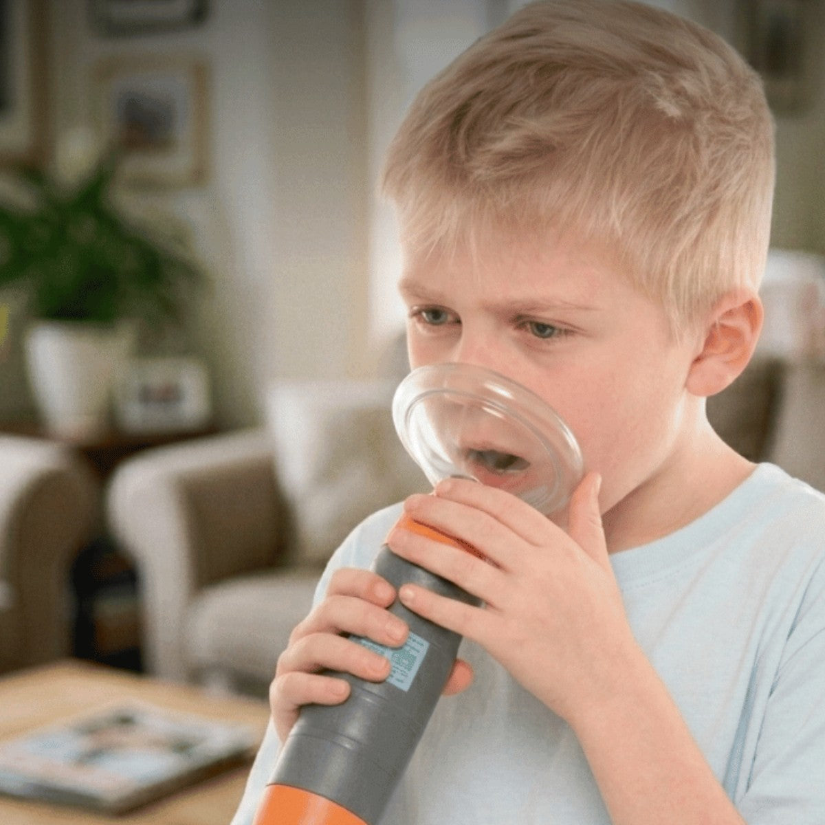 Child using the anti-choking rescue device at home