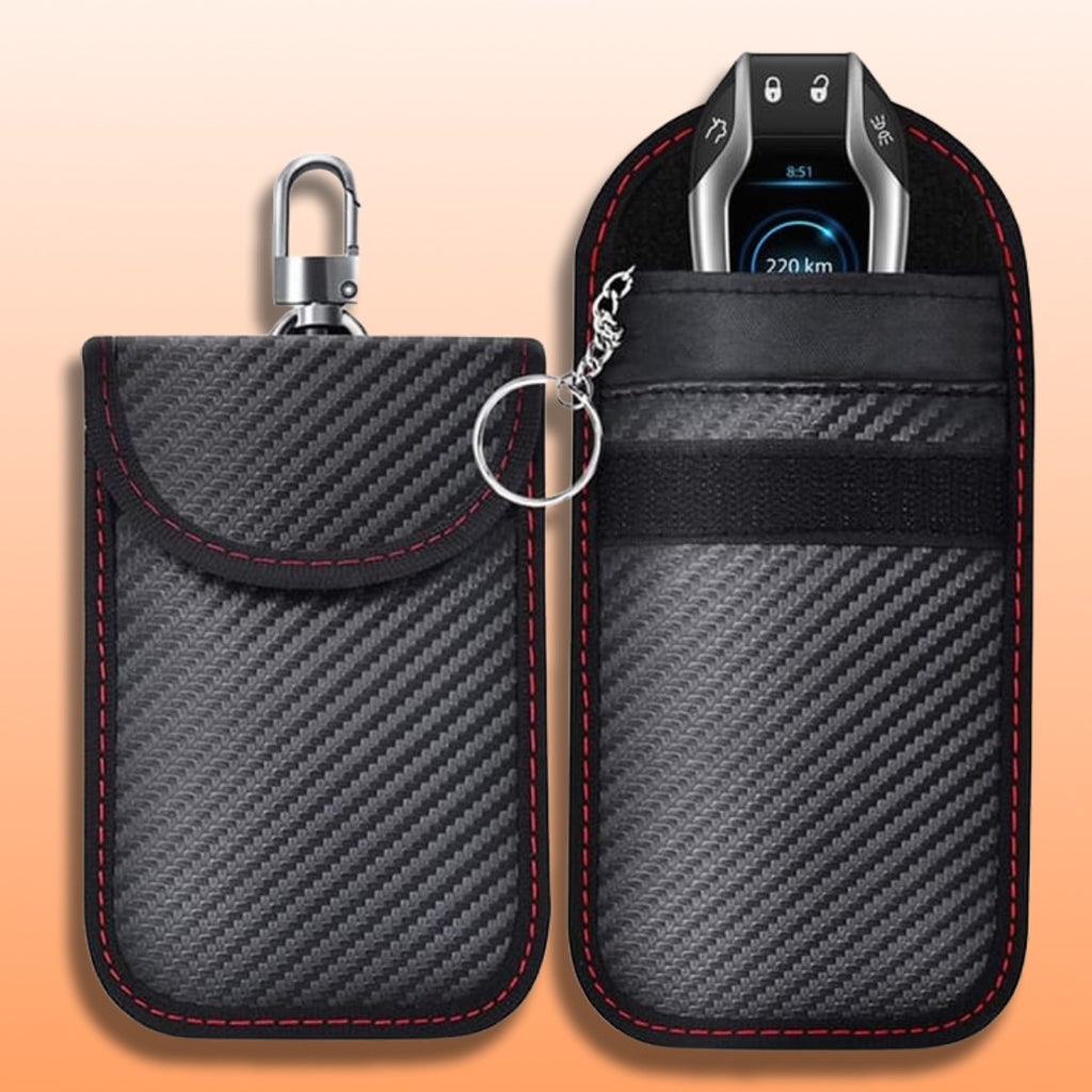 Faraday car key pouch twin pack in black carbon-fibre texture, one pouch holding a key fob