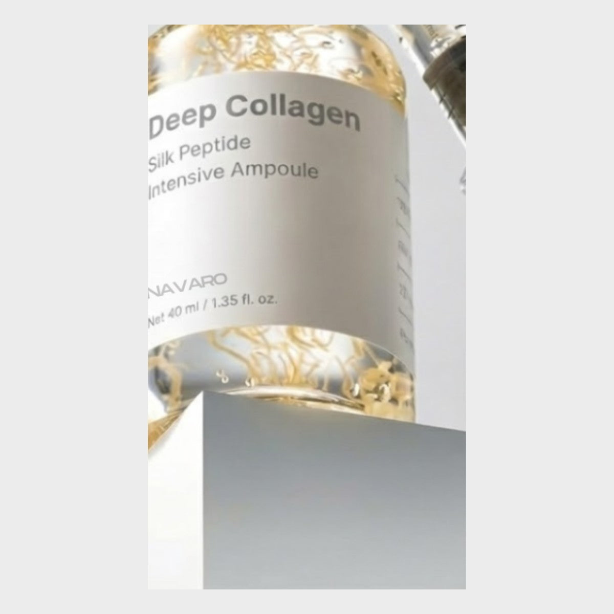 Deep Collagen ampoule bottle with gold silk peptide threads