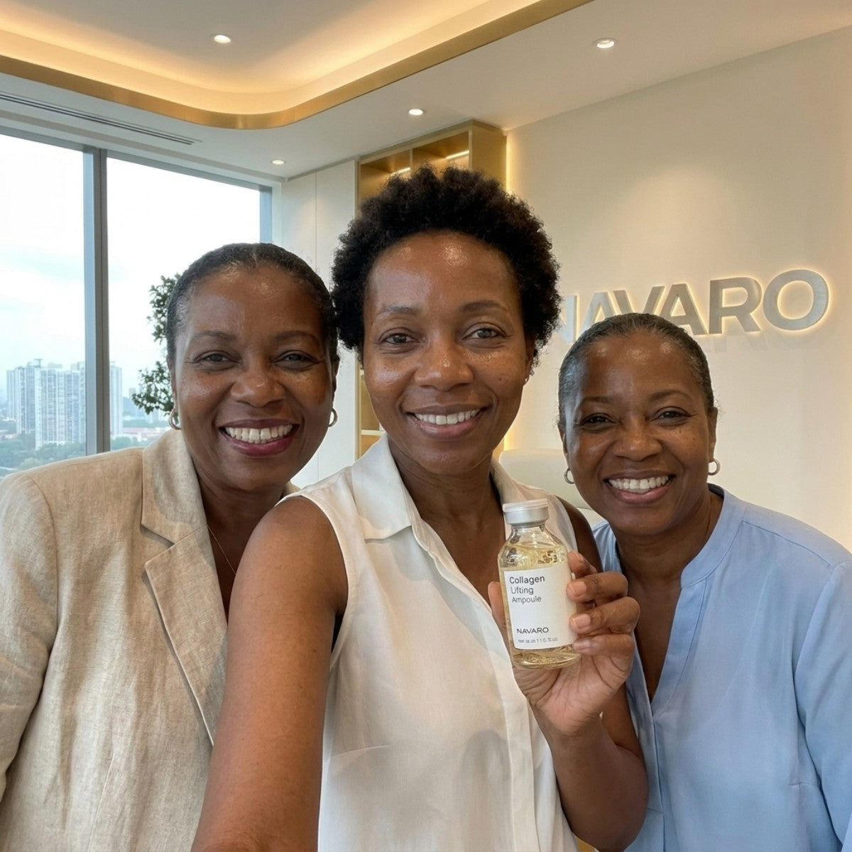 Three women smiling, one holding the collagen ampoule