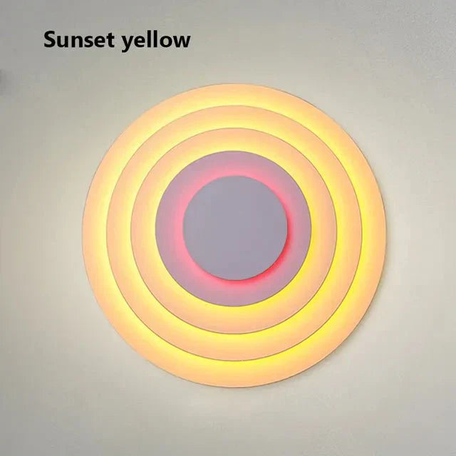 Pastelově barevná soustředná nástěnná lampa