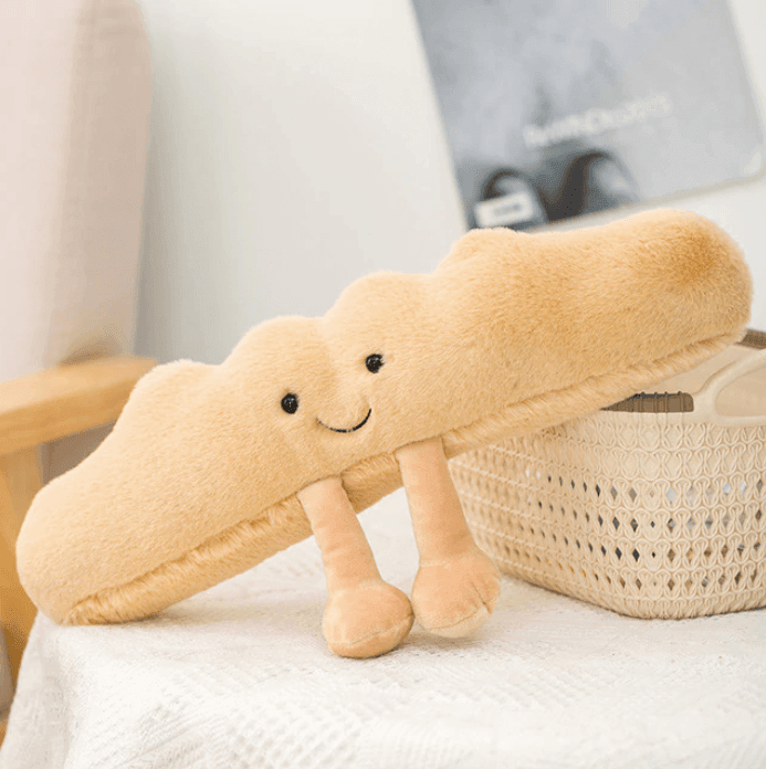 Giocattoli di peluche a forma di brezel, croissant e pane tostato