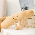 Giocattoli di peluche a forma di brezel, croissant e pane tostato