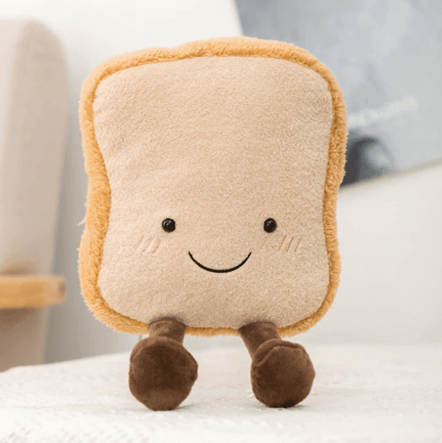 Giocattoli di peluche a forma di brezel, croissant e pane tostato