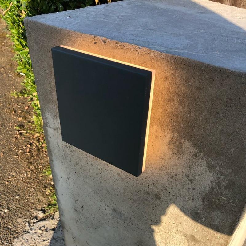 Lumière LED moderne pour extérieur en forme de disque